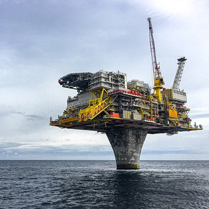 Picture of an oil and gas platform at sea