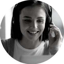 Black and white rounded picture of a woman giving telephone customer assistance